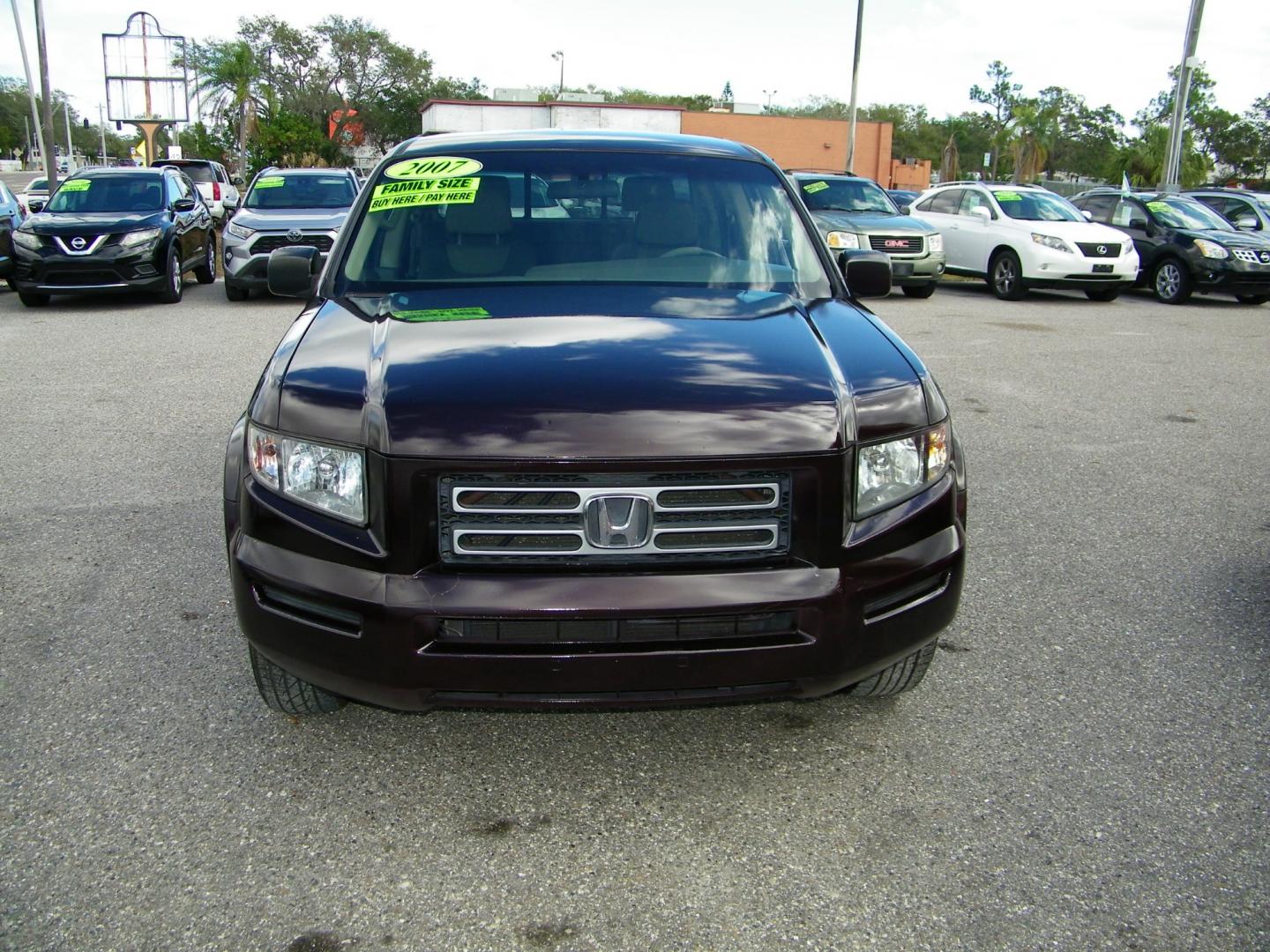 2007 Maroon /Grey Honda Ridgeline RT (2HJYK16267H) with an 3.5L V6 SOHC 24V engine, 5-Speed Automatic Overdrive transmission, located at 4000 Bee Ridge Road, Sarasota, FL, 34233, (941) 926-0300, 27.298664, -82.489151 - Photo#1